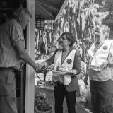 Rep. Bonamici shaking the hand of a senior citizen